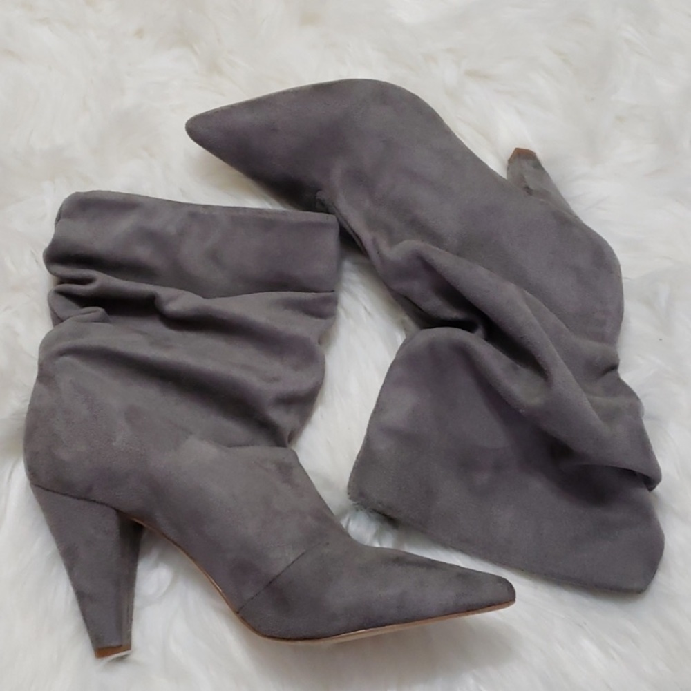Carlos Santana sues slouchy boots